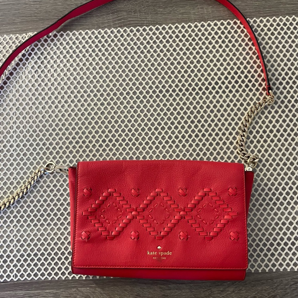 Has some discoloration with the katespade name in the front